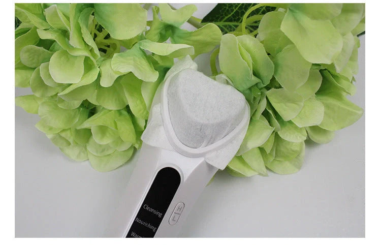 Electric Ultrasonic Facial Beauty Device in white, compact and portable design