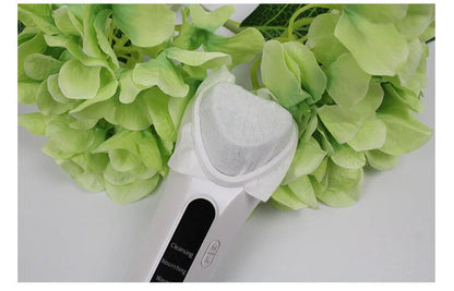 Electric Ultrasonic Facial Beauty Device in white, compact and portable design