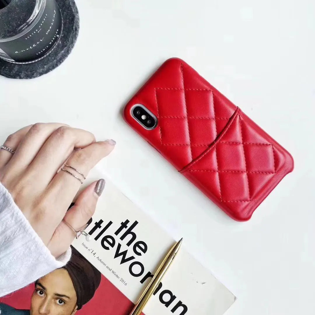 Leather mobile phone case for iPhone XS Max in black, pink, and red colour options.