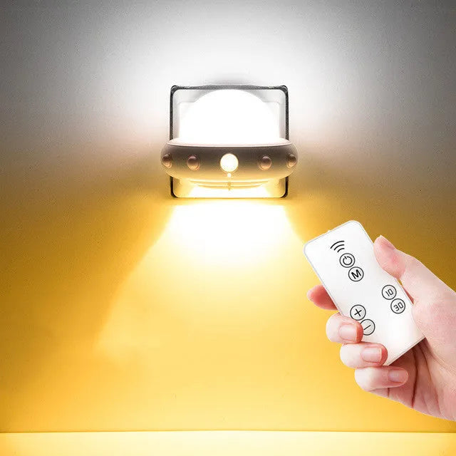 Remote control UFO bedside night light in blue, pink, or white colours with compact 105mm x 76mm dimensions