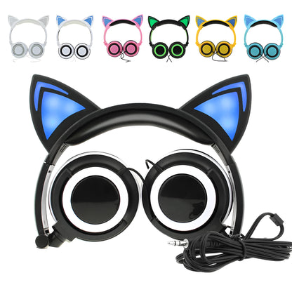 Colourful LED cat ear headphones with illuminated ears and cushions on a black background