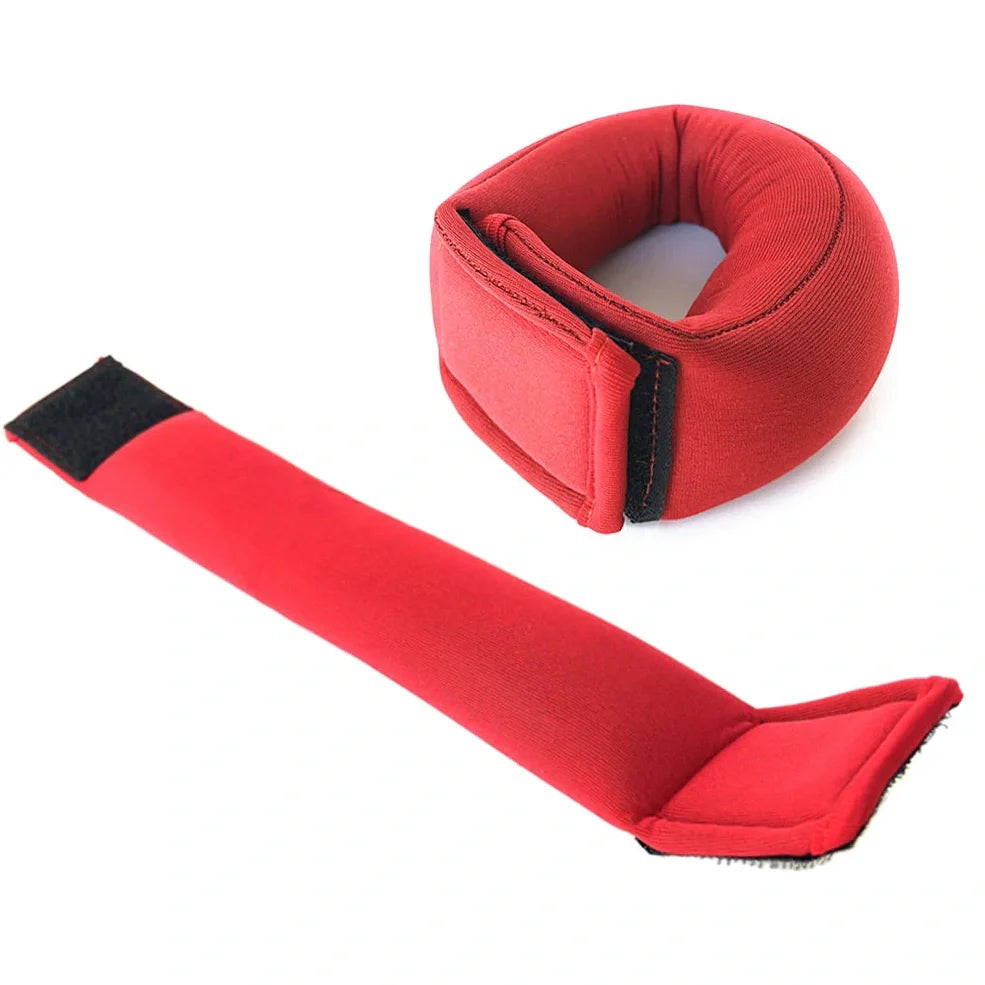 Red neoprene weight-bearing sandbags with reinforced stitching for strength training