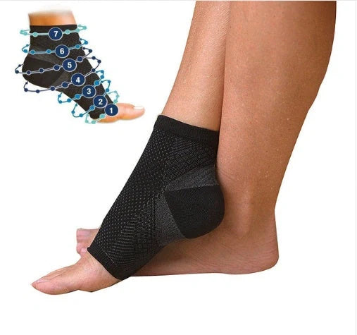 Anti-fatigue compression foot sleeves for men and women in black, red, and white