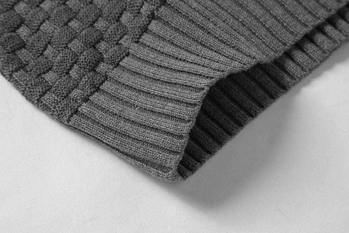 Man wearing a cotton-polyester blend hooded sweatshirt in grey, showing the front design and hood.