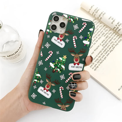 Green TPU iPhone case featuring a cartoon Christmas tree elk and striped design on the back.