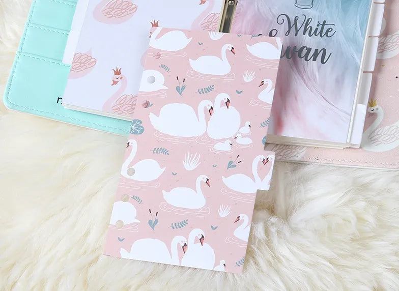 Set of six white A6 separator pages with colourful 'Swan handbook' design, showing front and back with index tabs.