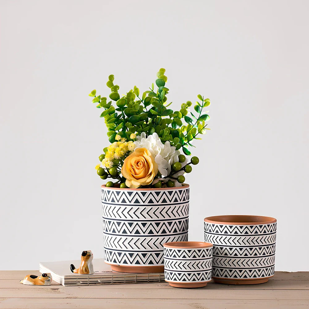 White ceramic geometric flower pot with Nordic design in three sizes for indoor plants