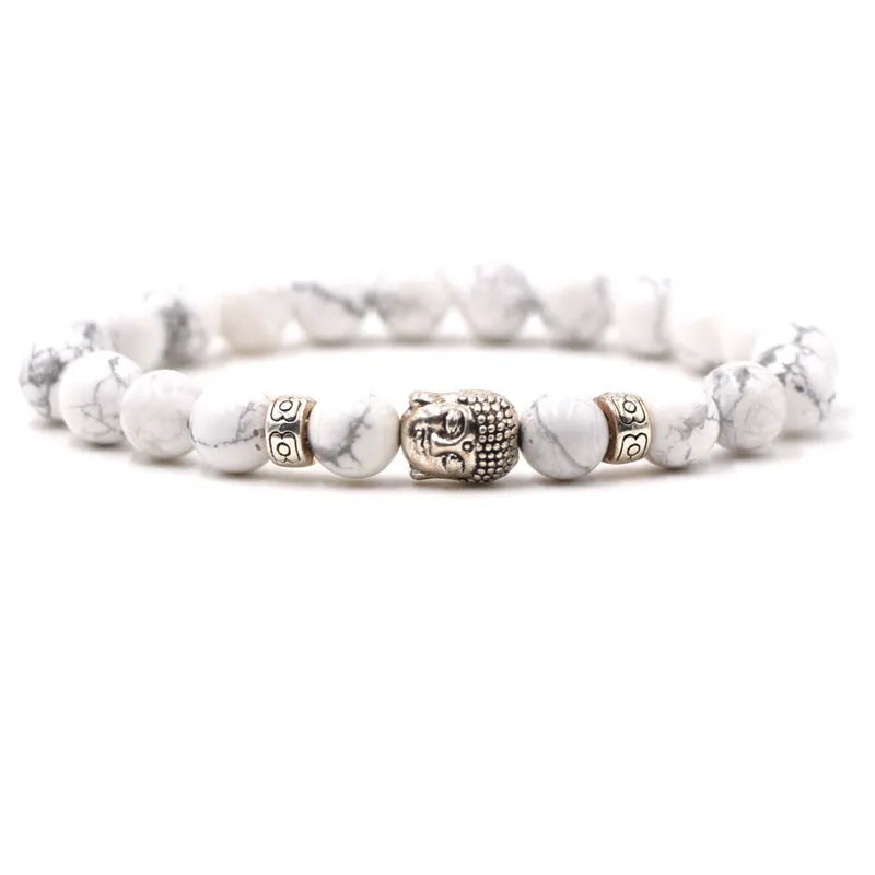 Natural stone stretch bracelet with round beads in various colours including Tigereye and turquoise.