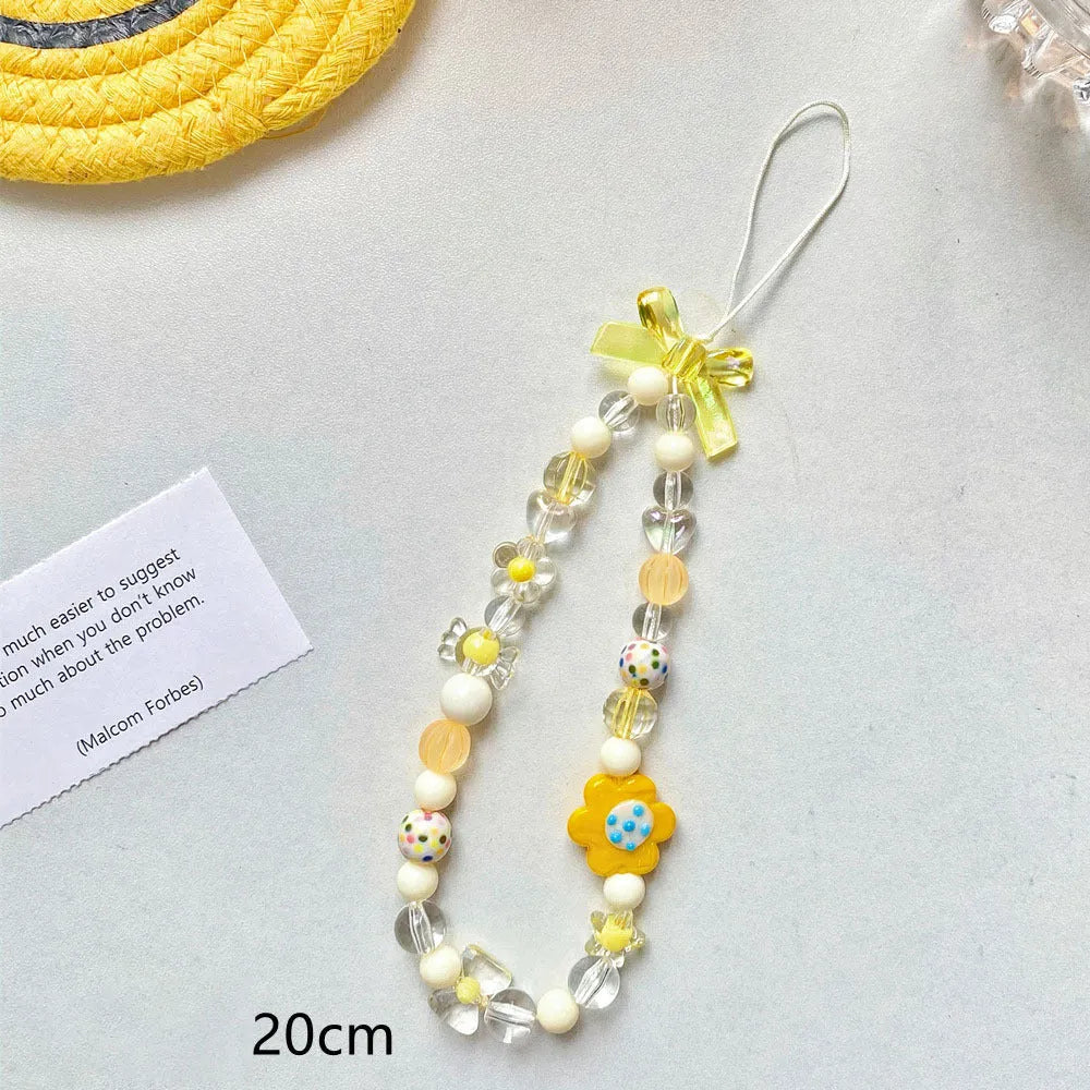 Beaded flower mobile phone lanyard with blue resin flowers on adjustable 120cm cord and secure clasp