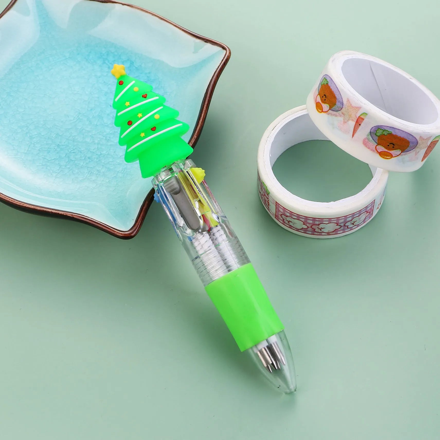 Christmas four-colour ballpoint pen with press mechanism showing festive designs