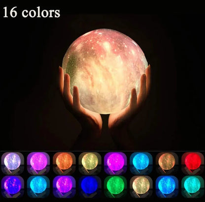 3D-printed spherical lunar night light with LED colours and remote control on a dark surface