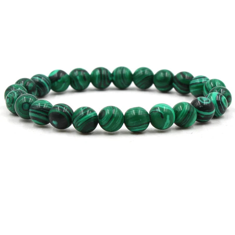 Elegant malachite stone bracelets with unique textures and patterns, perfect for a stylish accessory.