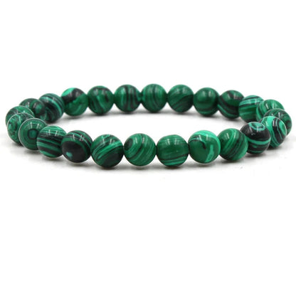 Elegant malachite stone bracelets with unique textures and patterns, perfect for a stylish accessory.