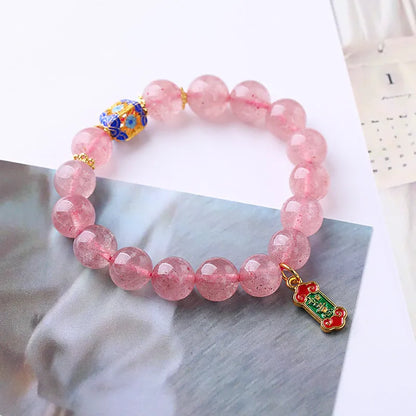 Pink strawberry quartz crystal bracelet with Ruyi charm, hand-woven in a national style.