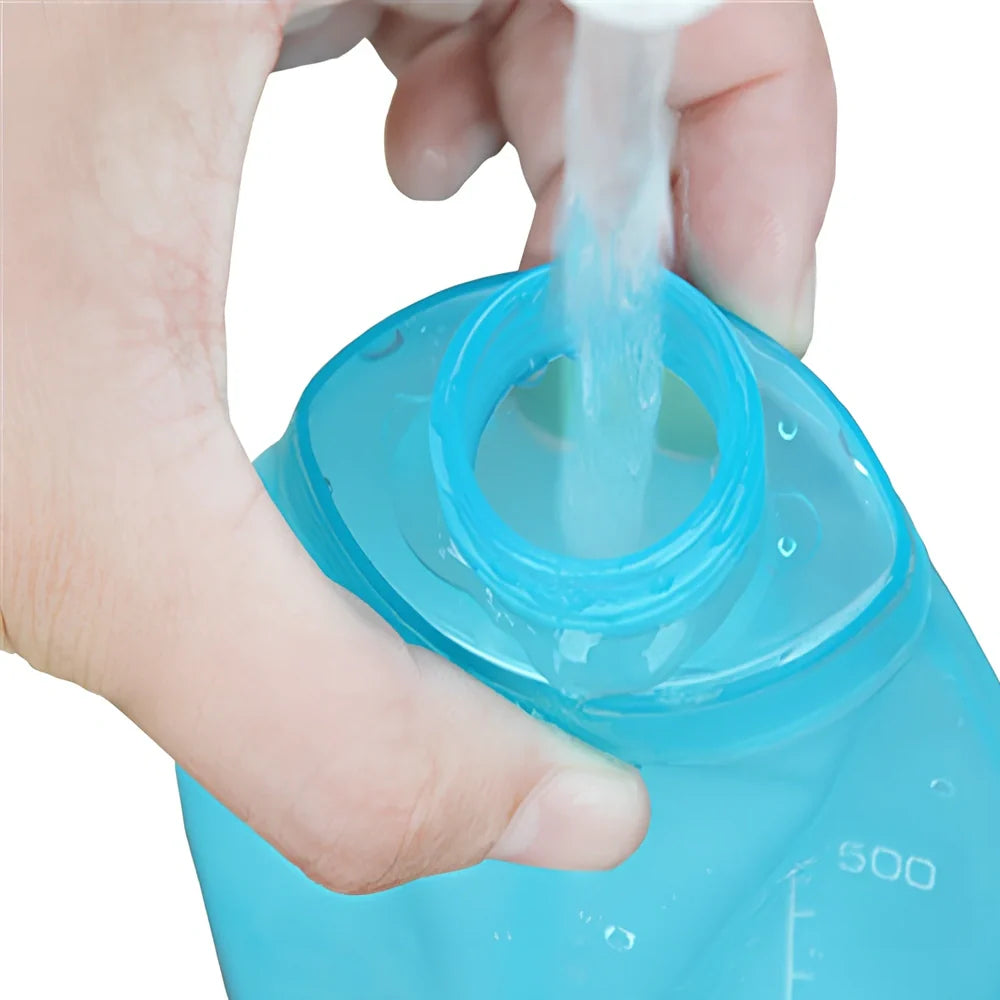 Sky blue folding TPU sports water bottle, 500ml capacity, leak-proof cap, collapsed view for portability