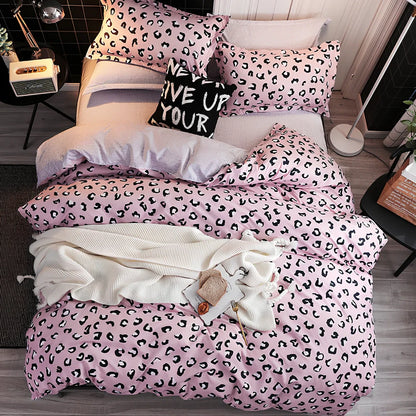 Pink polyester bedding set with twill weave duvet cover, pillowcases, and deep pocket fitted sheet in UK sizes