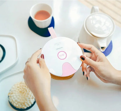 Compact USB-powered baby bottle sterilizer in blue and pink options