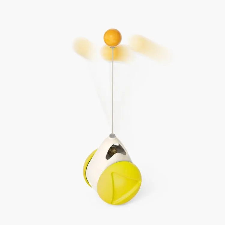 Cat rotating windmill toy with suction base, two transparent bins, blue and yellow-green TPR body.