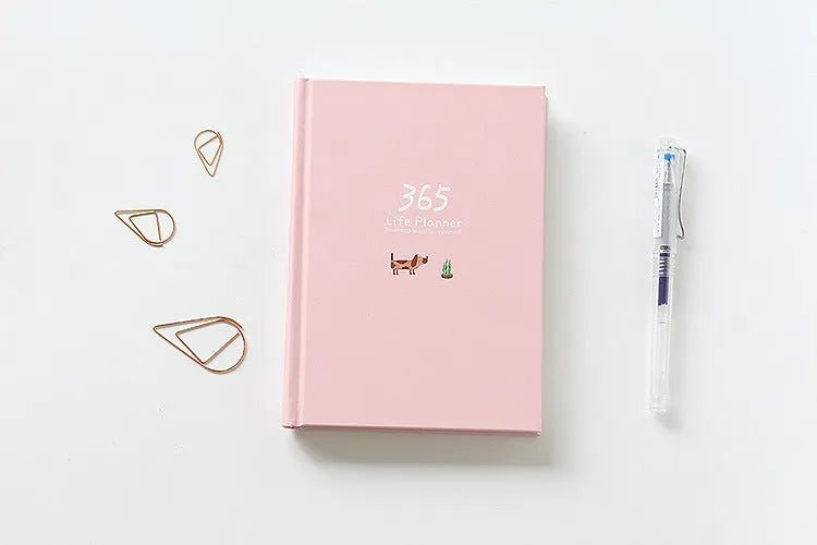 Hardback 365 day planner notebook, 13.5 x 18.2cm, 228 pages, 100gsm white cattle paper, Dark Green or Pink