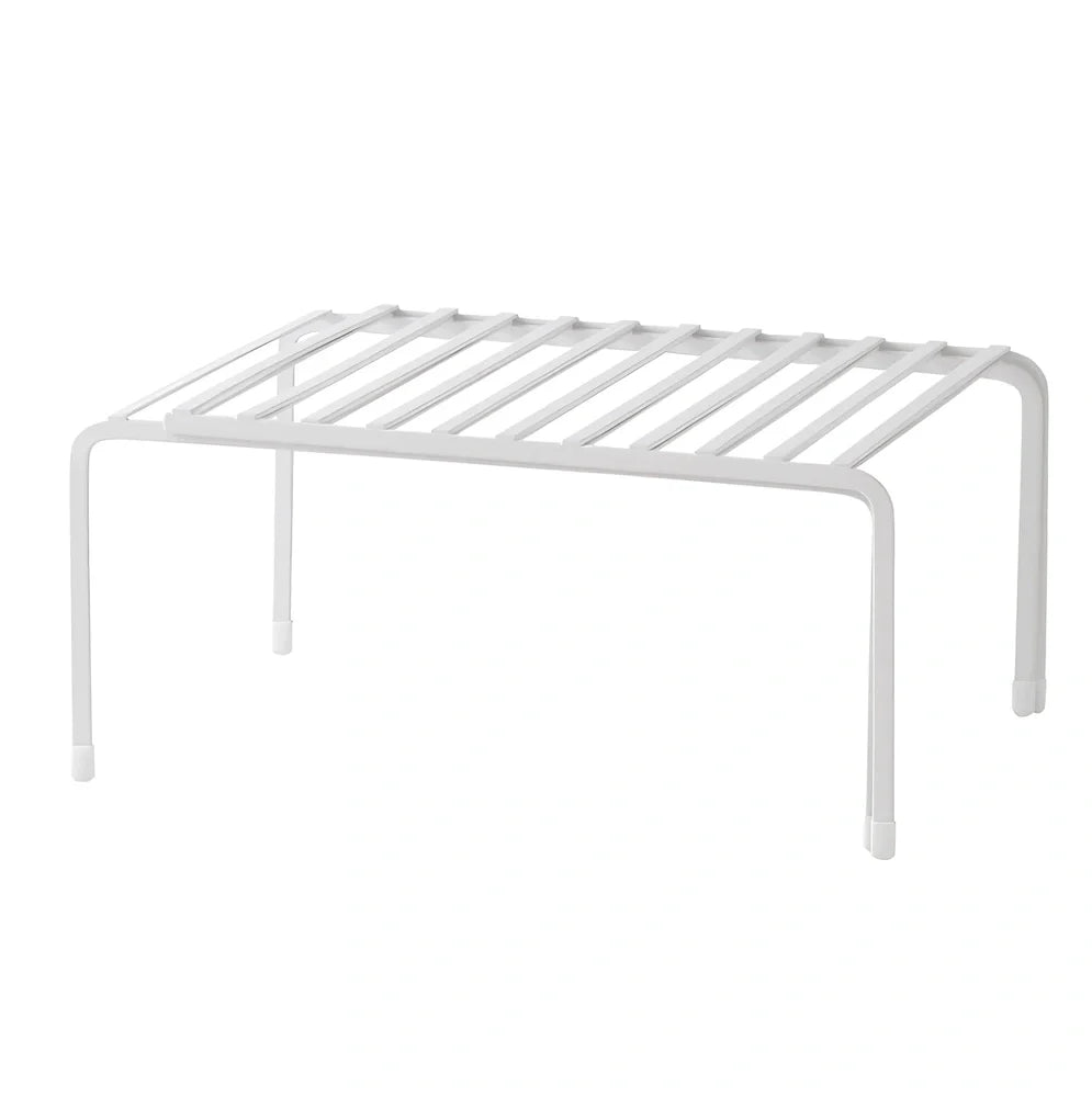 White retractable kitchen shelf extended to 60cm with spices and oils organised on metal surface