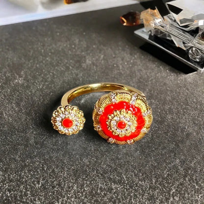 Adjustable copper gourd ring with zircon stones showing flower and bow design elements