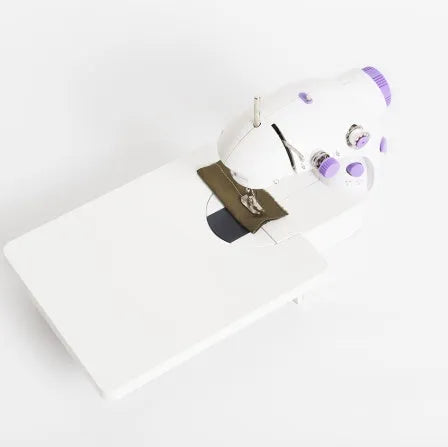Mini electric household sewing machine with compact 20cm design and included thread cutter