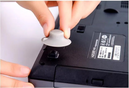 Gray plastic laptop cooling pad stand with two large and two small pads for temperature reduction