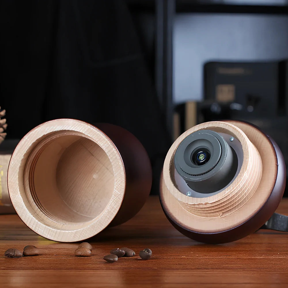 Manual coffee grinder with solid wood barrel and ceramic burrs for precise grinding control
