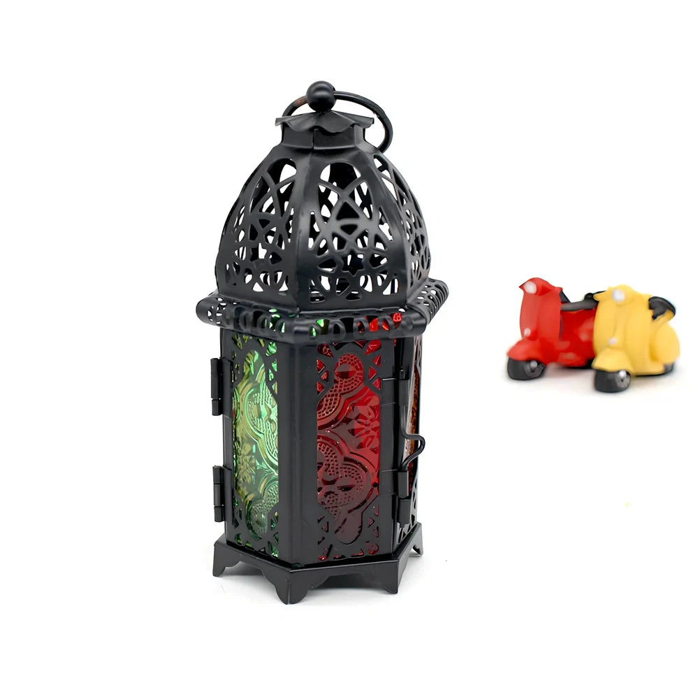 Wrought iron candle holder with 16cm height and 7cm diameter in black finish showing hanging design