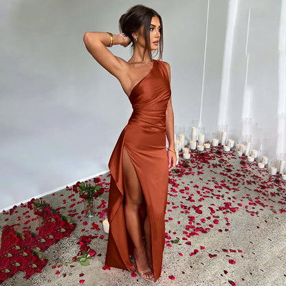One-shoulder backless slit dress made of luxurious satin, available in a variety of vibrant colors