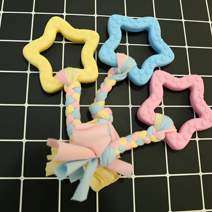 Non-toxic rubber dog chew toys in star, ring and ball shapes with textured cleaning surface