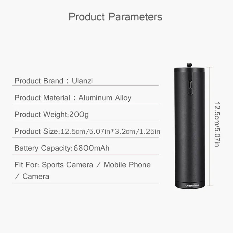 Black aluminium alloy portable power bank with an integrated carry handle, shown next to a smartphone for scale.