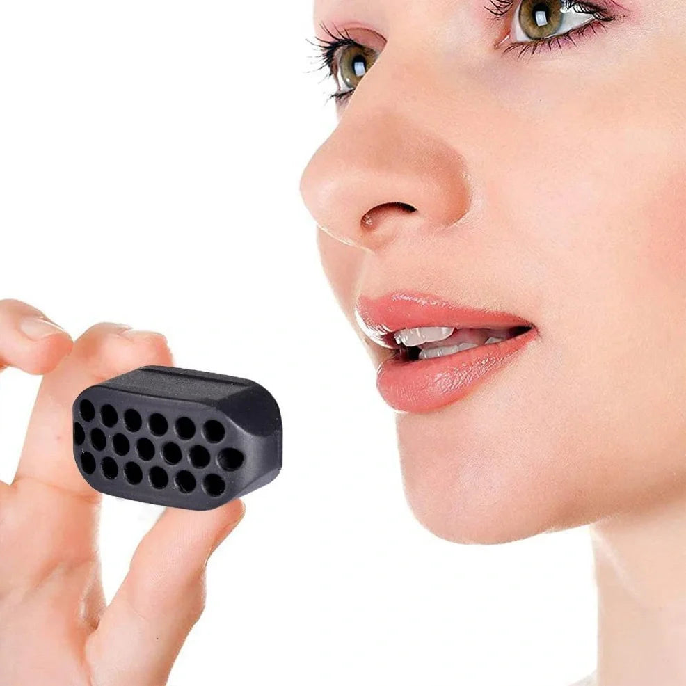 Compact black silicone jaw trainer for muscle shaping, food-grade material, portable at 5cm size for daily facial exercises