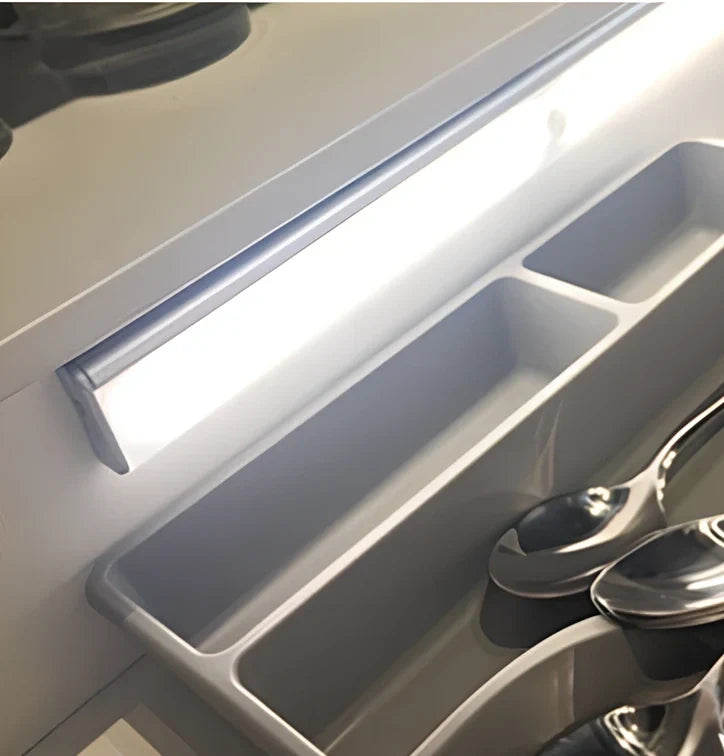 LED body sensor light with wireless charging base and motion detection for cabinet installation