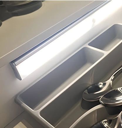 LED body sensor light with wireless charging base and motion detection for cabinet installation