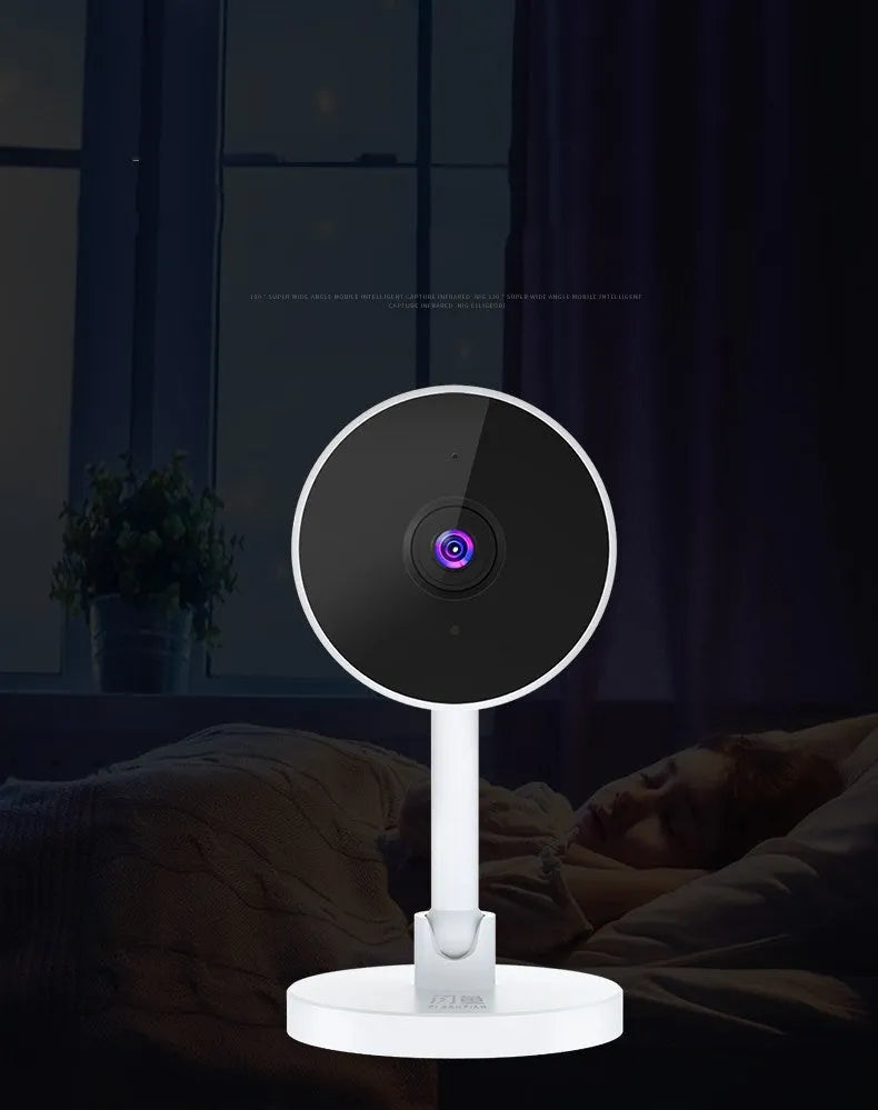 White gun-shaped Flash Fish WiFi home security camera on a table.