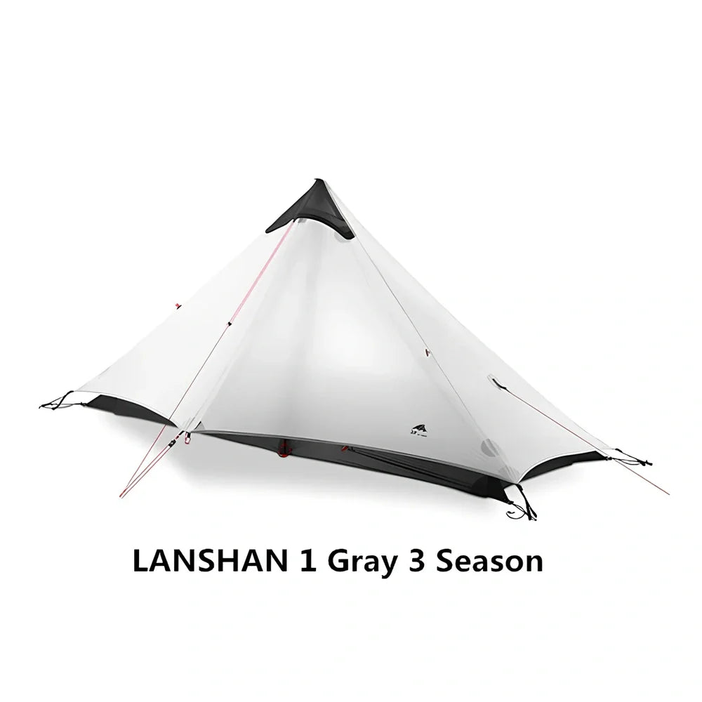 Single tip poleless tent with aluminium supports and camouflage design in outdoor setting