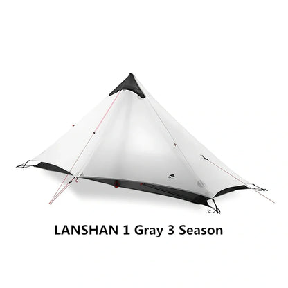 Single tip poleless tent with aluminium supports and camouflage design in outdoor setting
