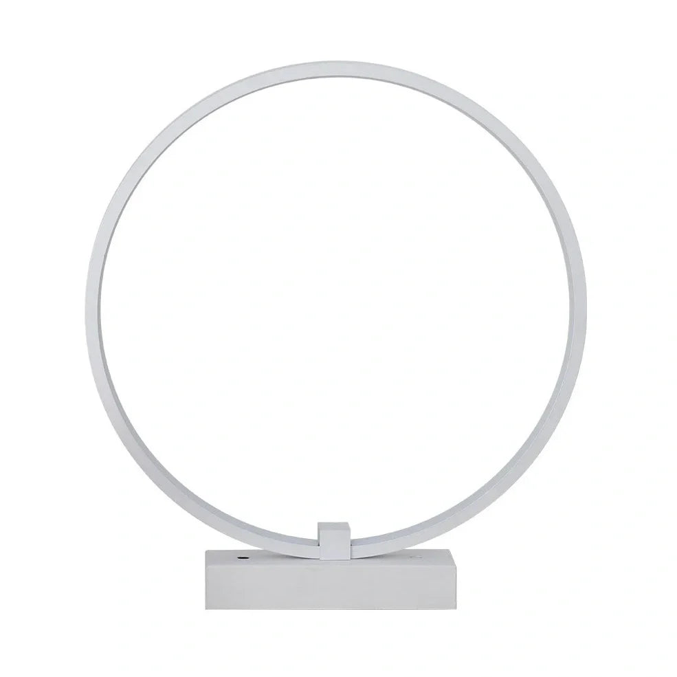 White circular LED bedside lamp with 25cm diameter on iron base showing warm white illumination