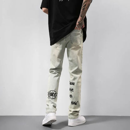 Khaki vintage washed straight-leg jeans with yellow mud dye and letter print, non-stretch mid-rise denim trousers.