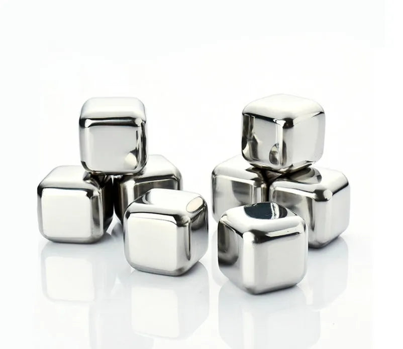 Set of eight stainless steel whiskey cooling stones with metal clip in plastic storage container