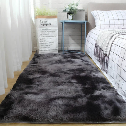 Tie-dyed variegated silk wool carpet floor mat showing organic colour patterns with polyester fibre suede backing