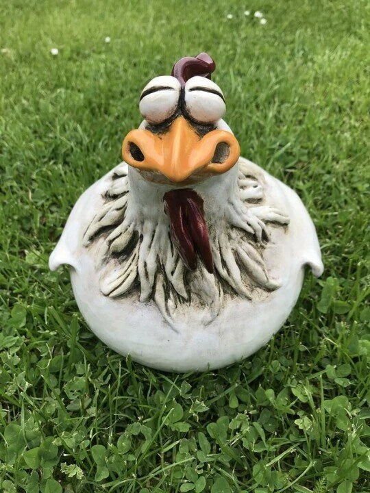 Resin chicken garden statue with vibrant colors and a playful design, perfect for adding charm to outdoor spaces