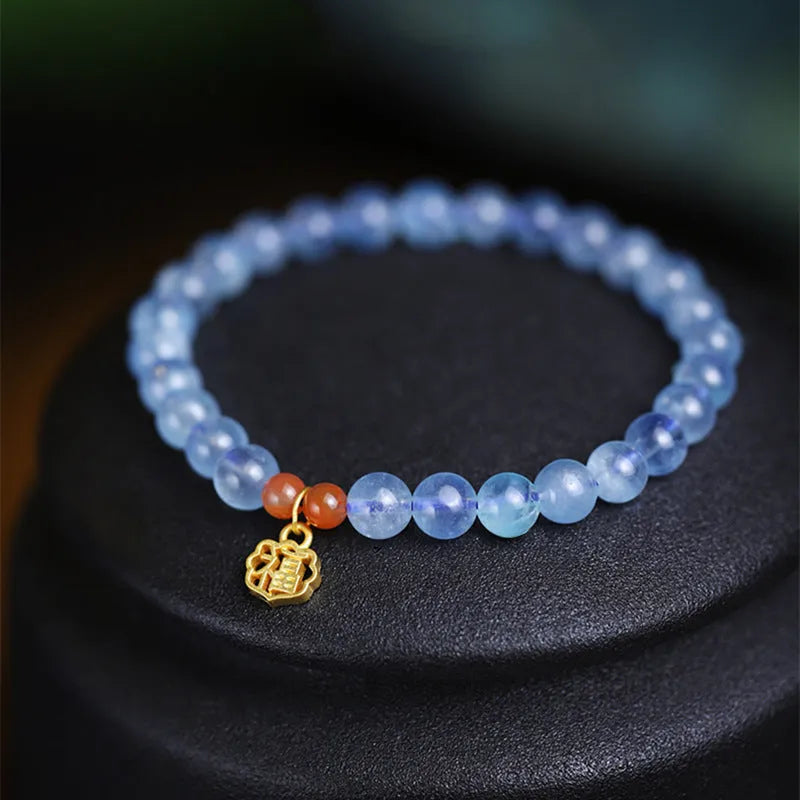 Women's bracelet with 8mm round ice translucent aquamarine crystal beads featuring sequin embellishments for a simple blessing card accessory in a natural icy colour tone, 13 weight unit measurement