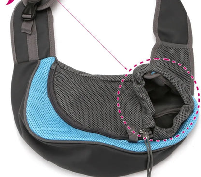 Blue pet backpack with mesh ventilation panels and adjustable padded shoulder straps for cat or small dog transport