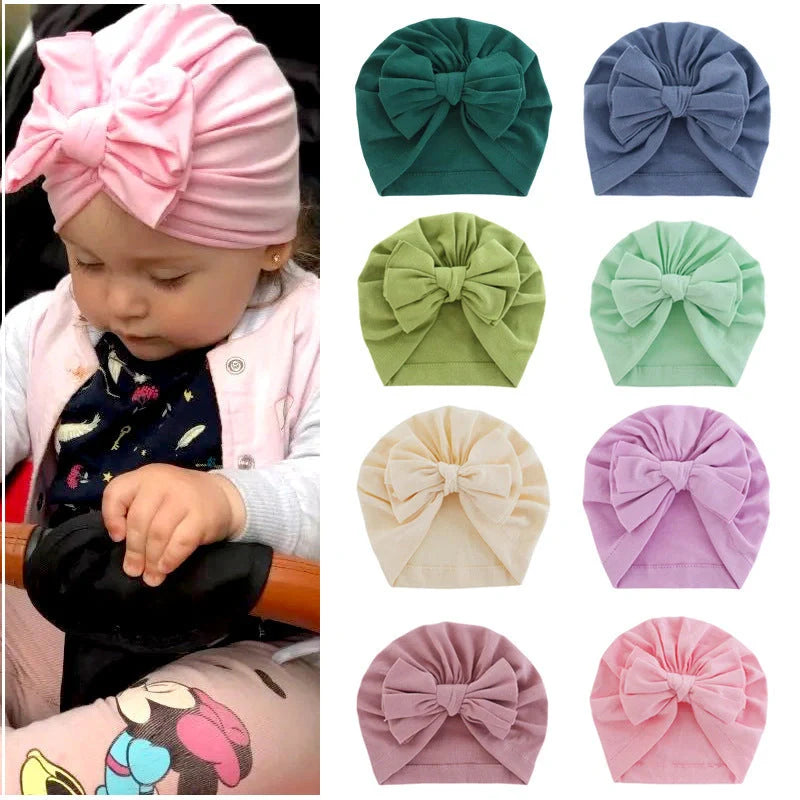 Soft hooded baby hat with bowknot in various colors for 0-1 year olds