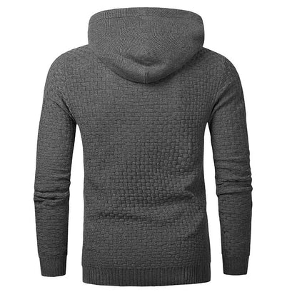 Man wearing a cotton-polyester blend hooded sweatshirt in grey, showing the front design and hood.