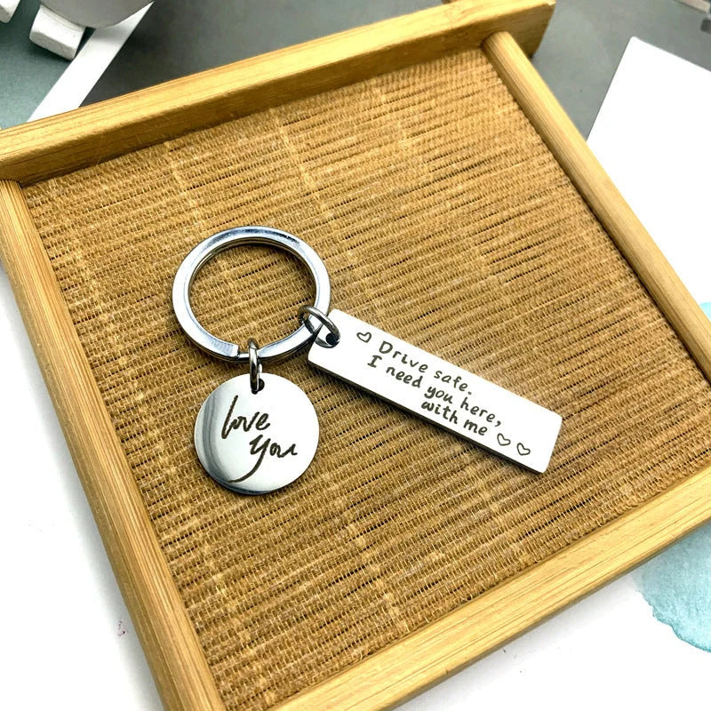 Stylish stainless steel safe driving keychain with unique message