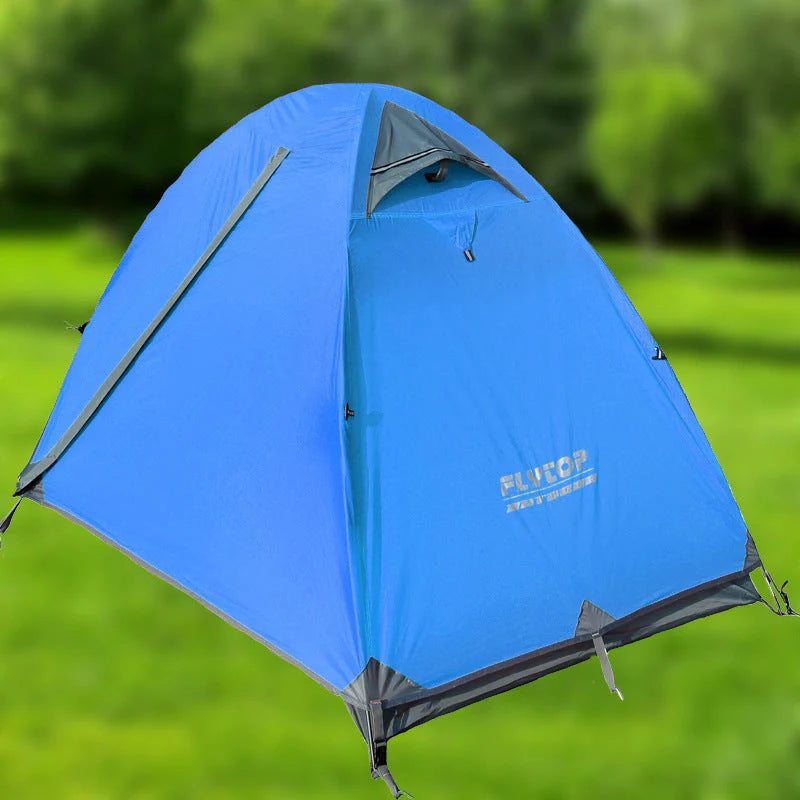 Double layer rainproof camping tent in green, orange, and blue colors for high altitude adventures