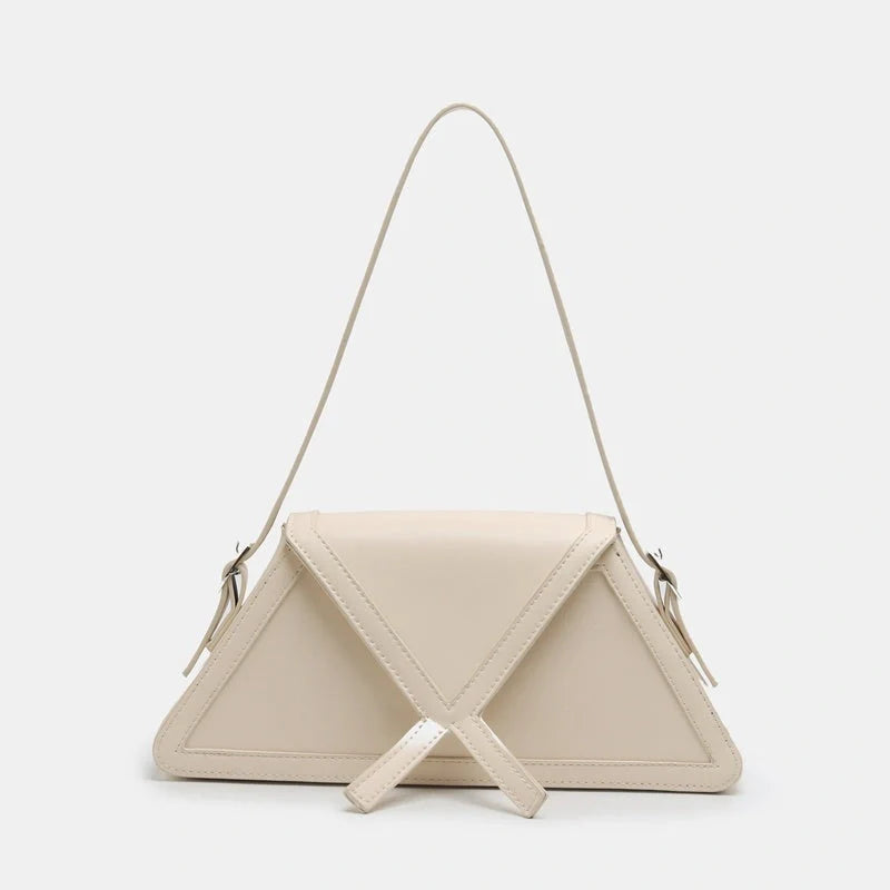 Stitching contrast trapezoid shoulder bag in black, beige, blue, and orange with magnetic buckle closure